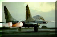 A Mig-29B takes off with its RD-33 turbofans in reheat