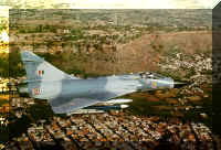 A Mirage 2000 flying across the backdrop of the historic Gwalior Fort